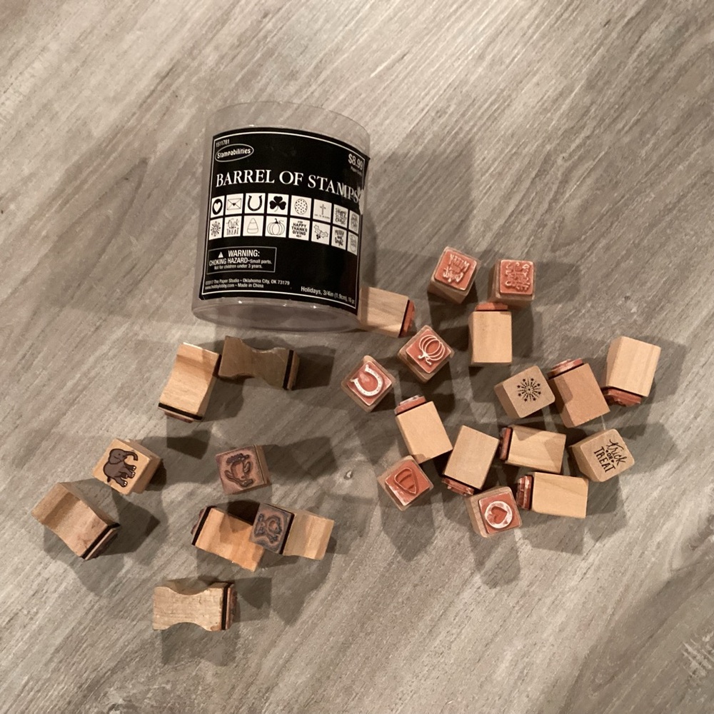 Barrel of Stamps with Wooden Handles
24 Pieces